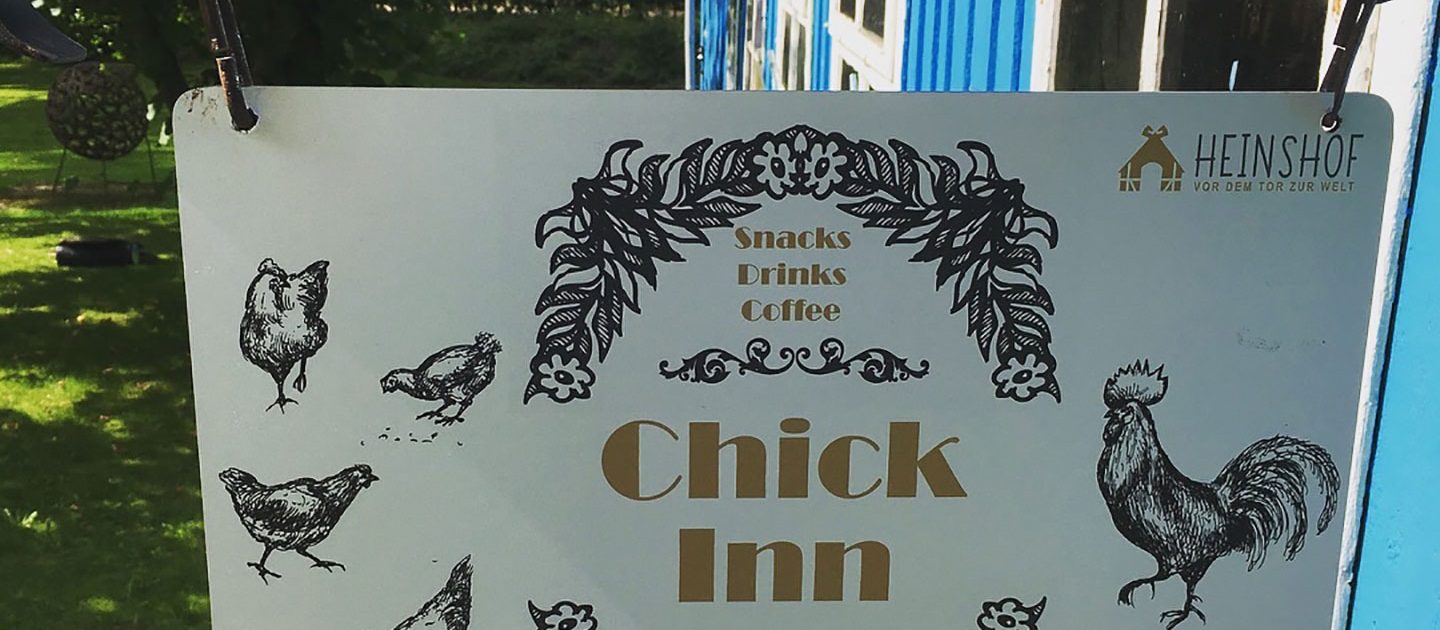 Check in area sign with name "chick inn"